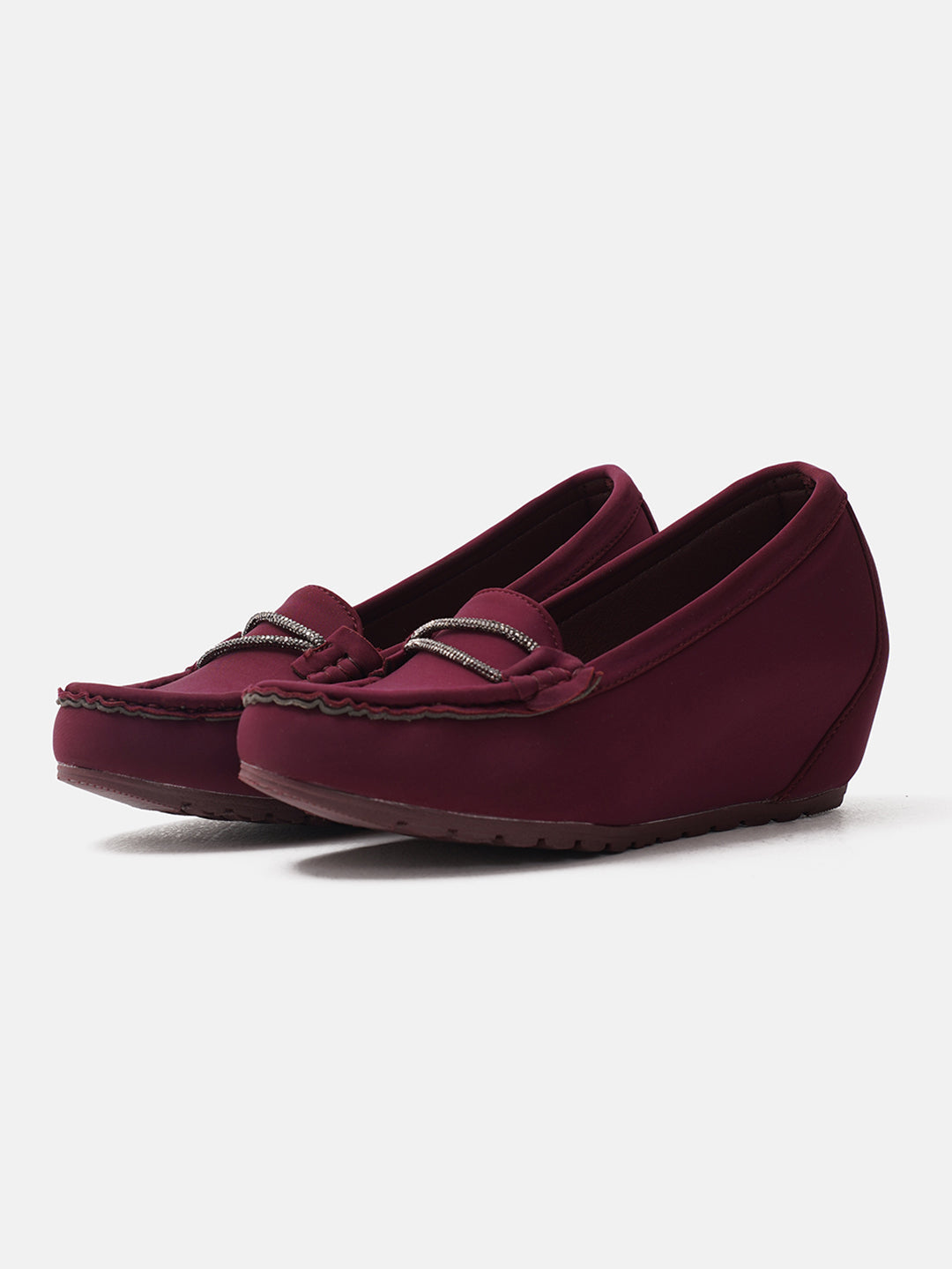 loafers with a subtle wedge heel and an embellished buckle detail on the vamp
 Cherry