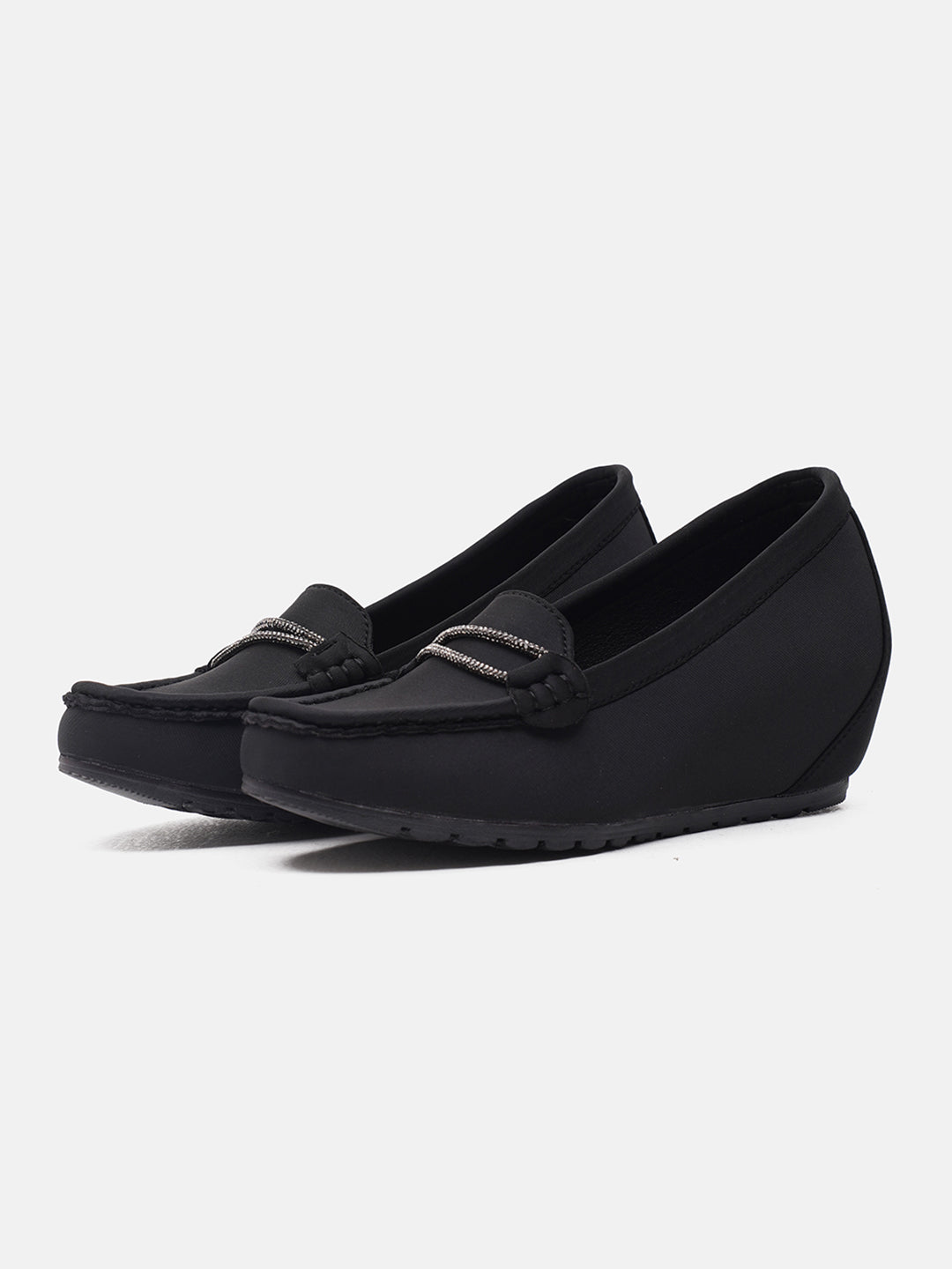 loafers with a subtle wedge heel and an embellished buckle detail on the vamp
 Black