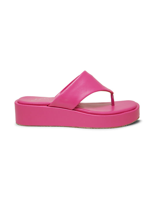 Pink platform thong-strap flat sandal with chunky wedge sole and cushioned footbed.
