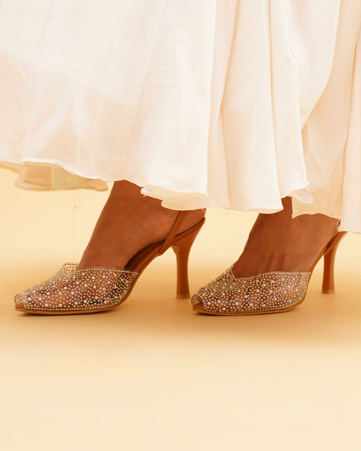 pointed toe slingback heels adorned with sparkling embellishments
 Tan