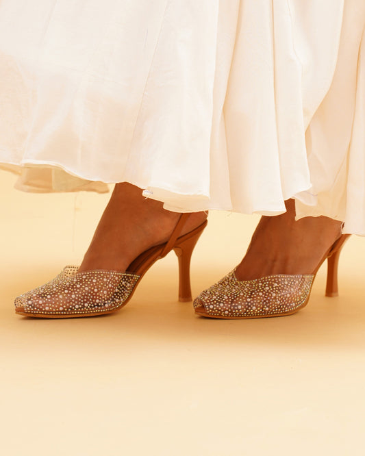 pointed toe slingback heels adorned with sparkling embellishments
 Tan