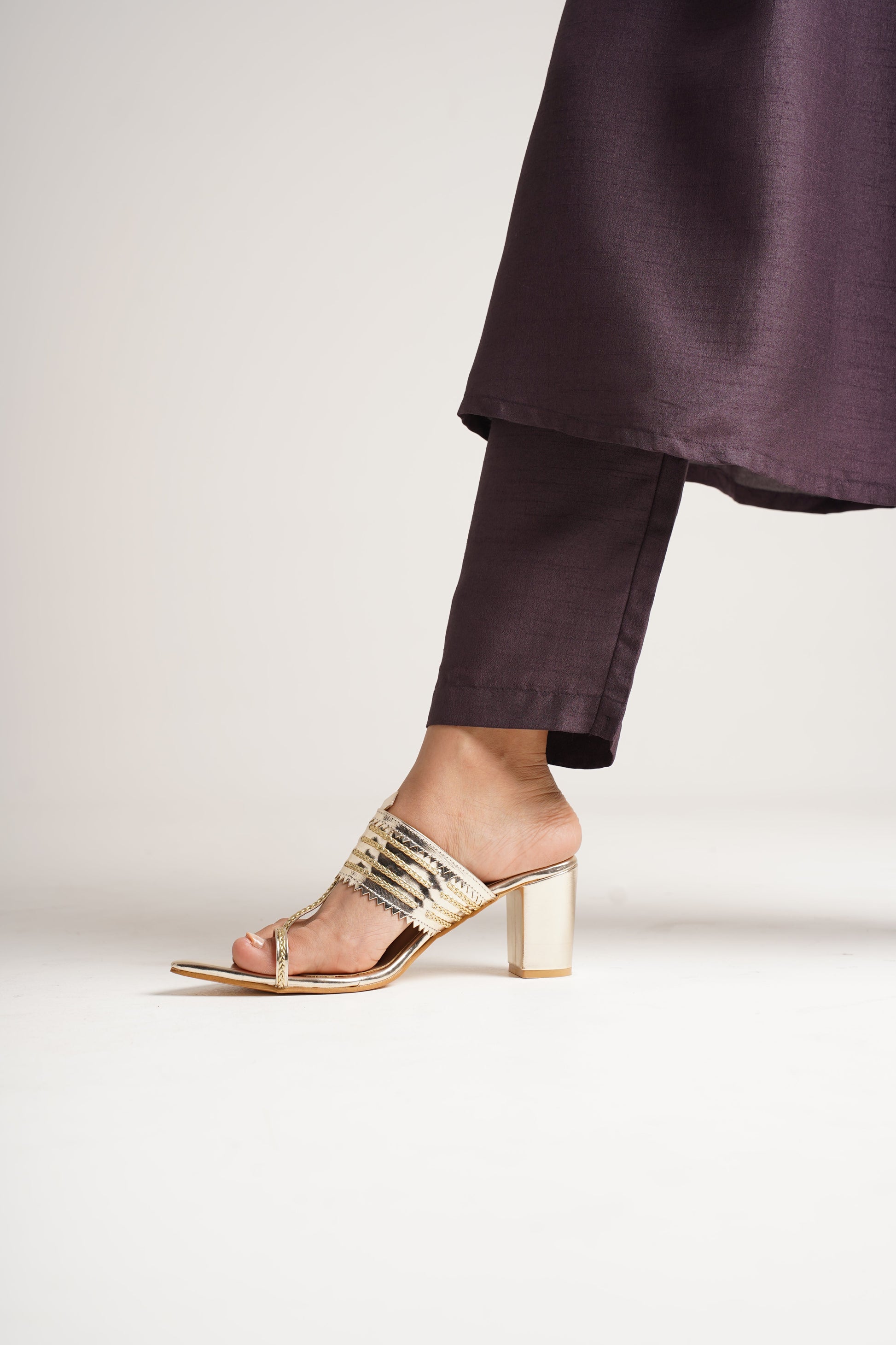 classic toe-ring block heels with a structured upper design
 Gold