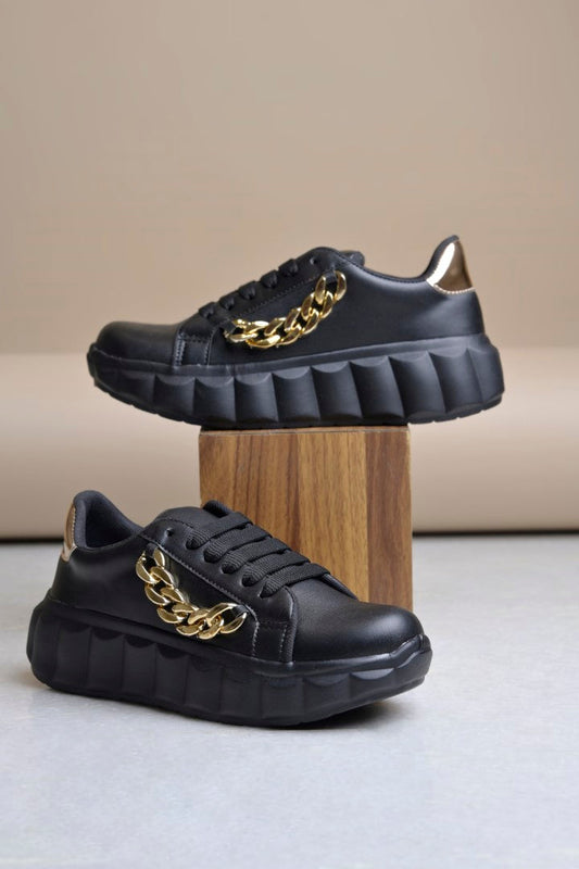 platform lace-up sneakers with a chunky sole and a decorative chain embellishment
 Black
