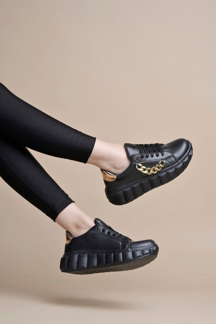 platform lace-up sneakers with a chunky sole and a decorative chain embellishment
 Black