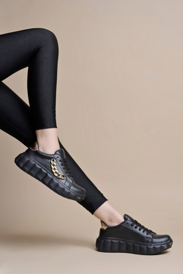 platform lace-up sneakers with a chunky sole and a decorative chain embellishment
 Black