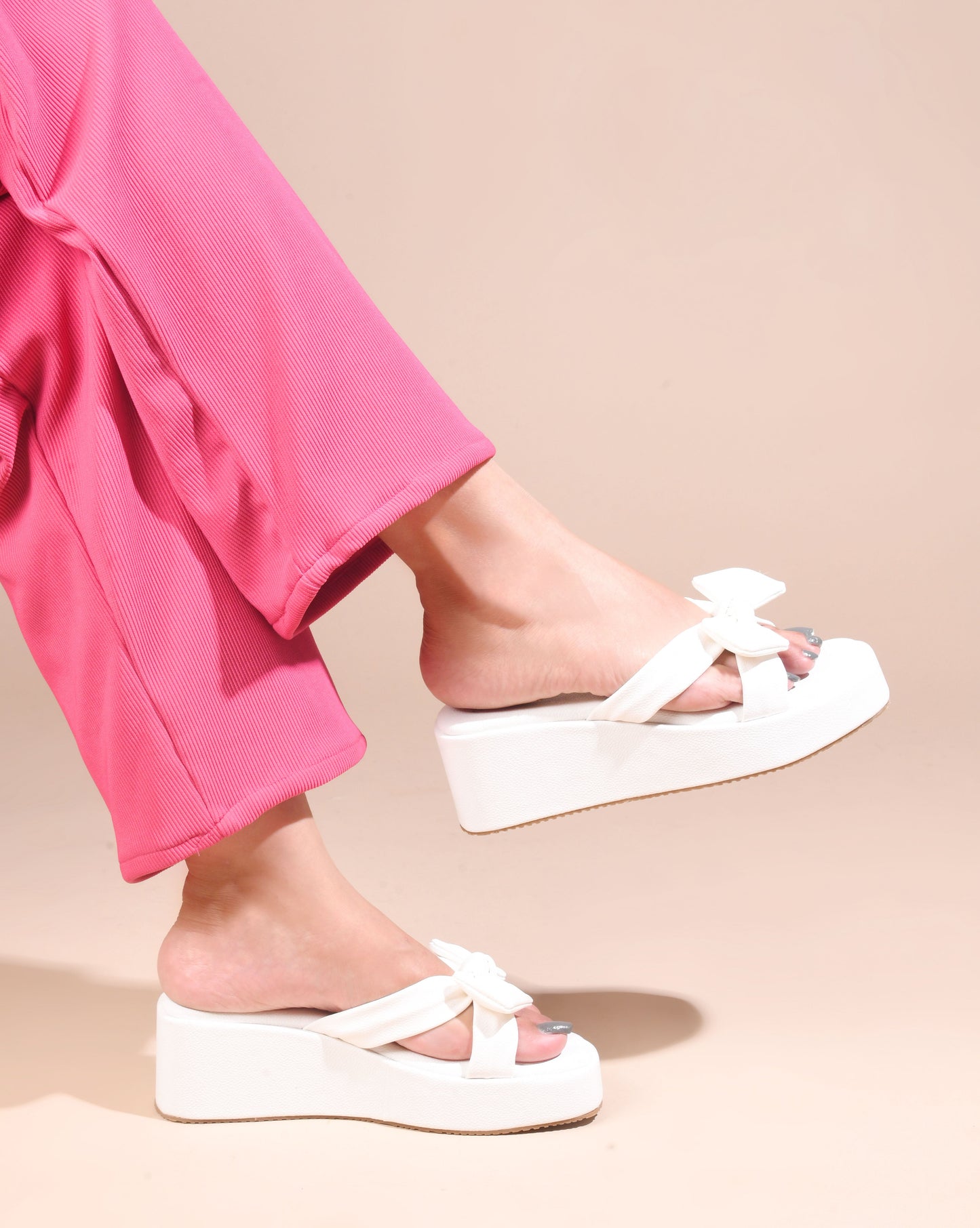 Jm Looks platform slides featuring a large, knotted bow on the strap
 White