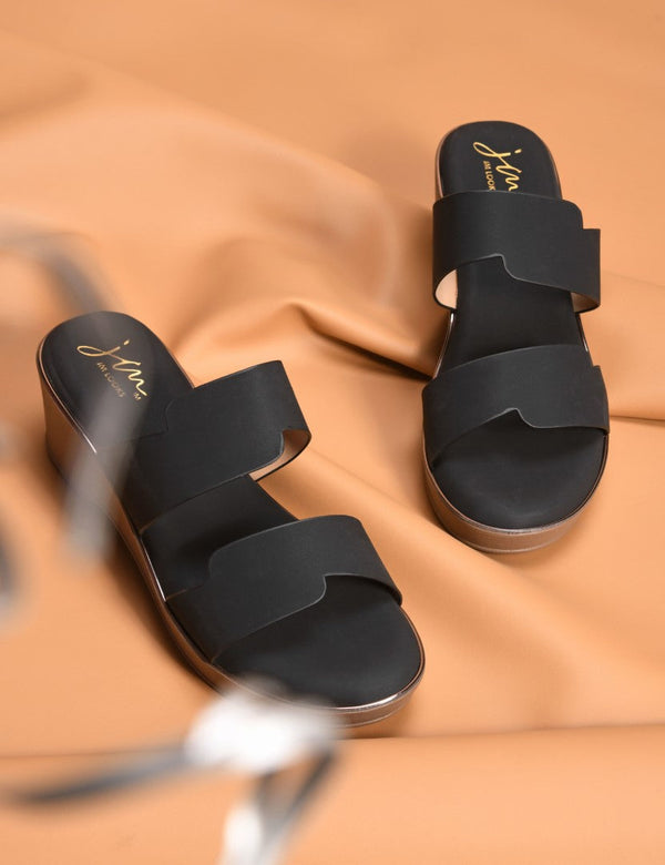 Black block wedge heels for women featuring dual wide straps, comfortable platform sole, slip-on style.