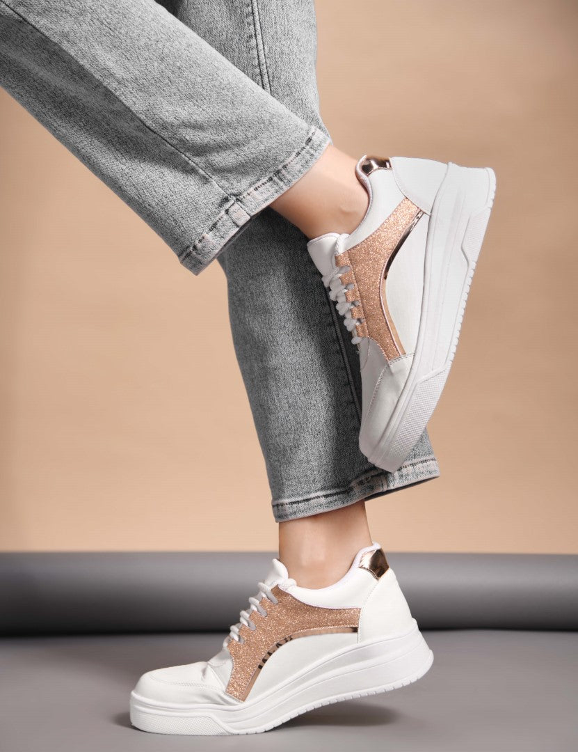 platform lace-up sneakers with a sparkly side panel and a chunky sole
 Sultan
