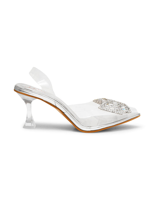 Transparent pointed toe heels with sparkling crystal embellishment, clear sculpted heel, and rose gold metallic insole silver