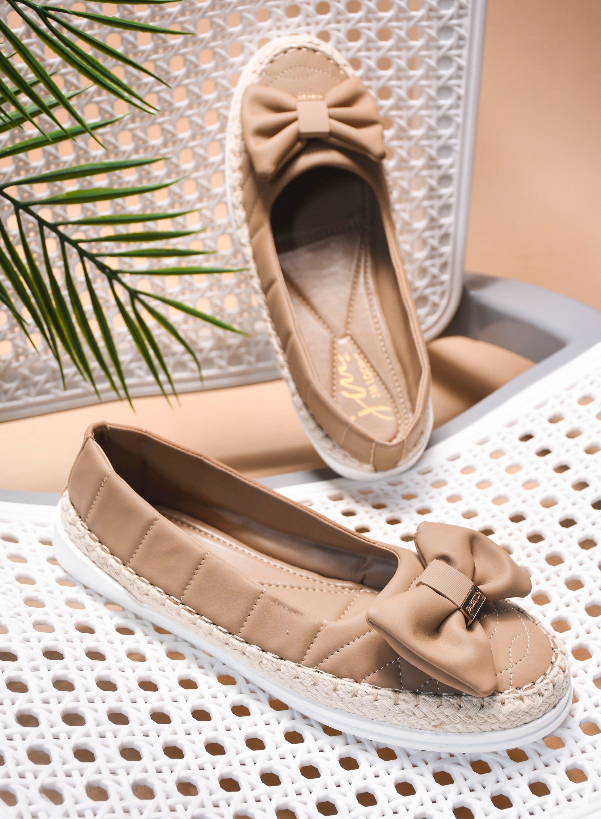 JM Looks espadrille loafers featuring a prominent bow and woven sole detail
 Toupe