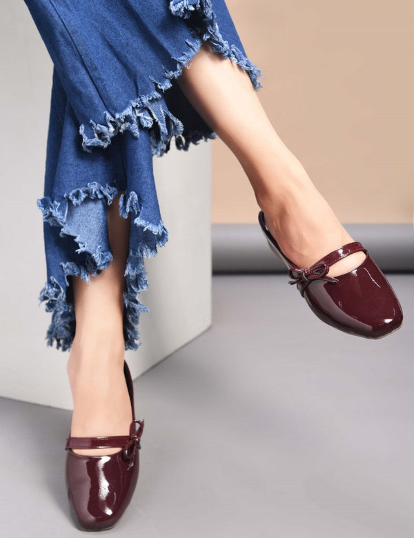 Women's cherry red patent slip-on mules with bow detail