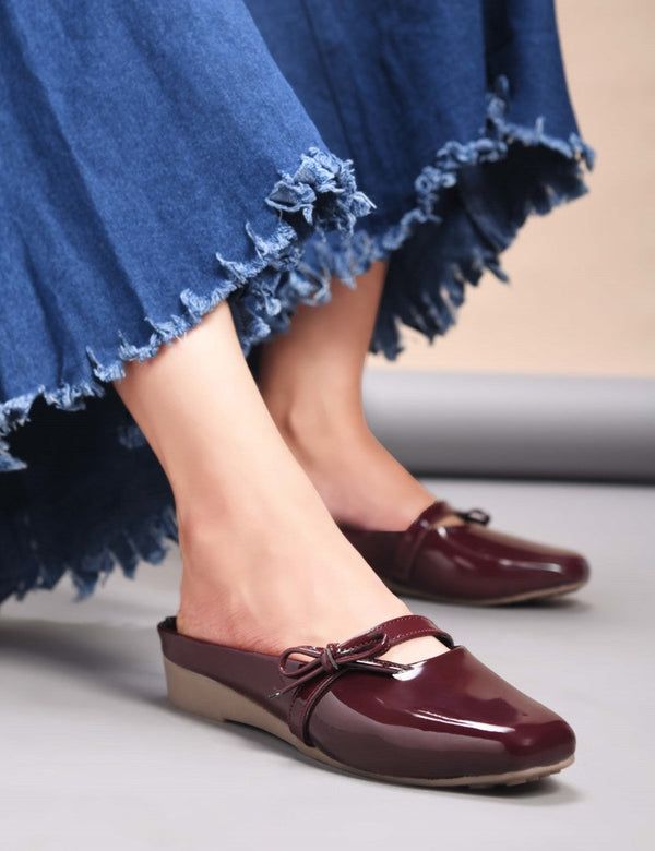 Women's cherry red patent slip-on mules with bow detail