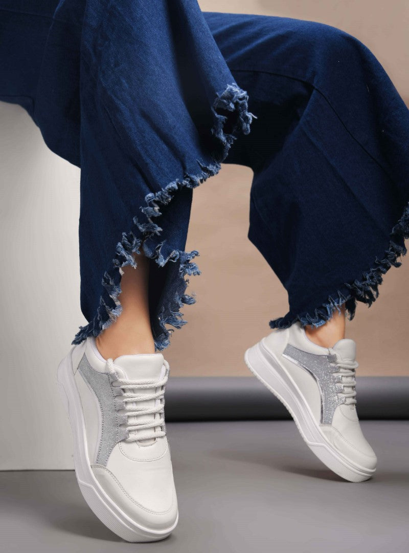 platform lace-up sneakers with a sparkly side panel and a chunky sole
 Silver