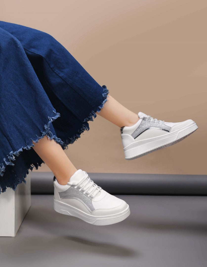 platform lace-up sneakers with a sparkly side panel and a chunky sole
 Silver