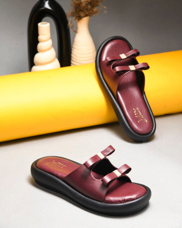 JM Looks slide sandals featuring multiple bow details on the wide straps and a flat sole
 Cherry