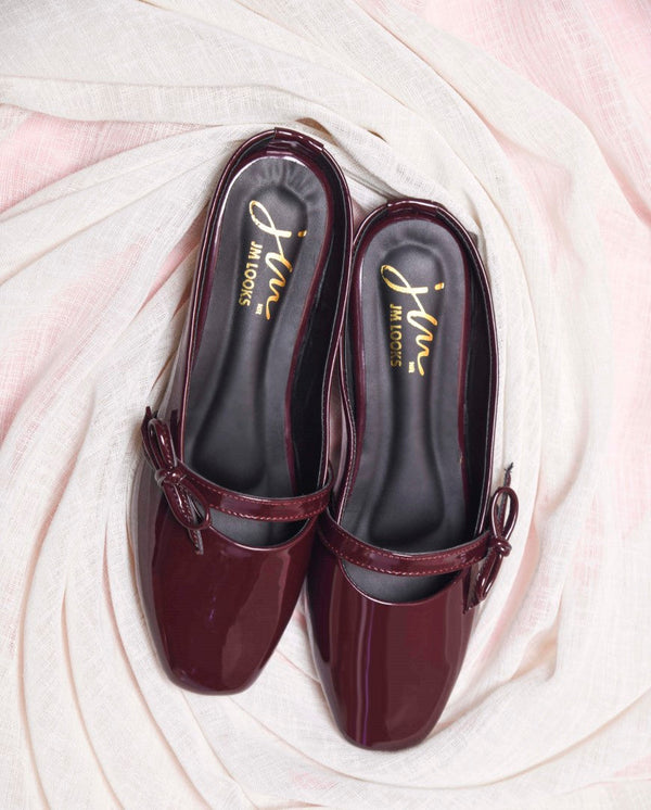 Women's cherry red patent slip-on mules with bow detail