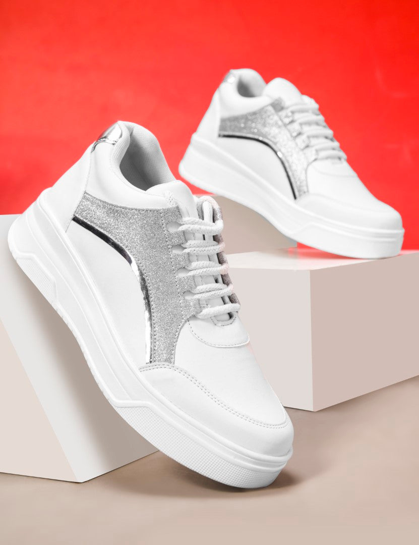 platform lace-up sneakers with a sparkly side panel and a chunky sole
 Silver