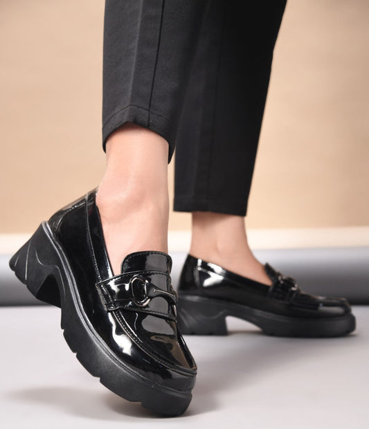 Jm Looks chunky sole loafers with a buckle detail on the vamp
 Black