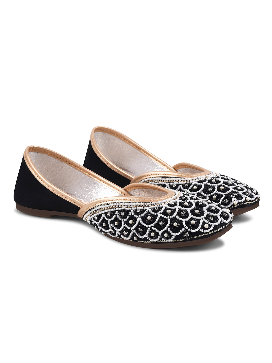 exquisitely embellished juttis featuring a detailed petal design
 Black