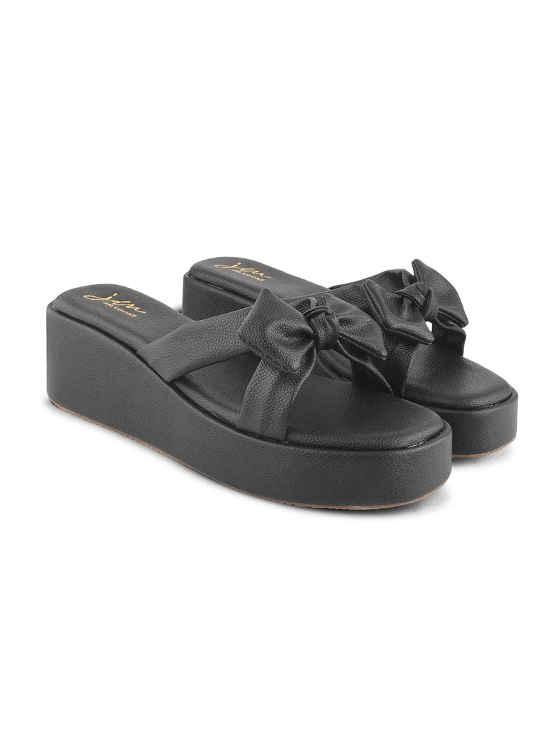 Jm Looks platform slides featuring a large, knotted bow on the strap
 Black