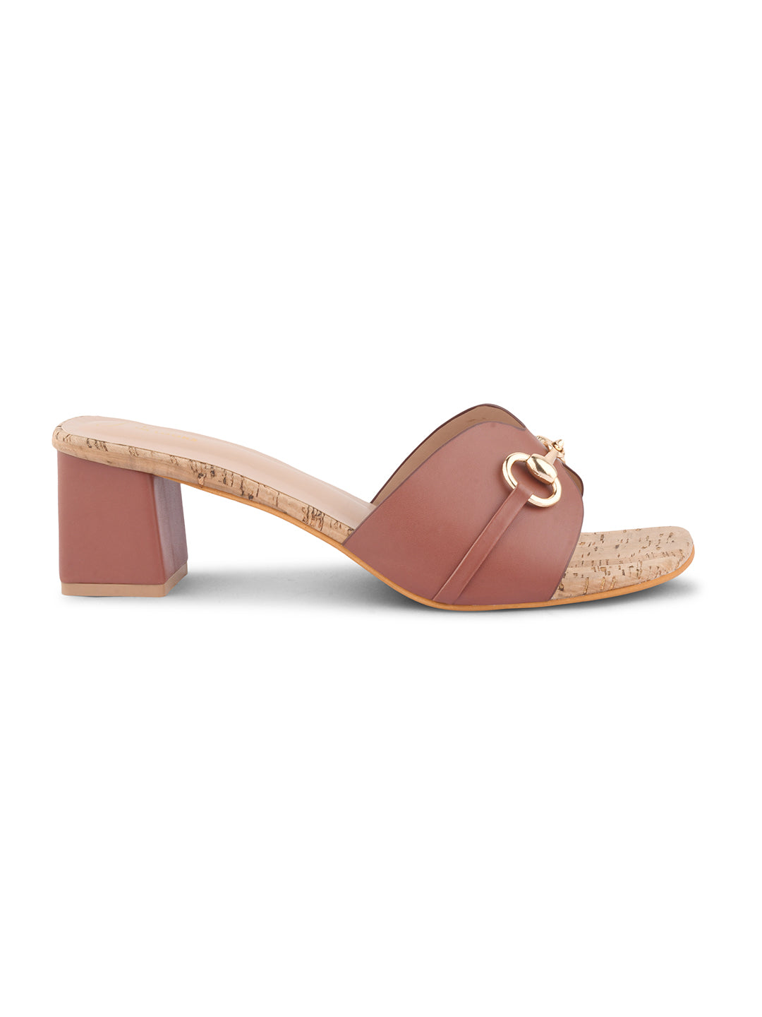 women's mules featuring a wide strap with a buckle embellishment and a cork-textured block heel
 Tan