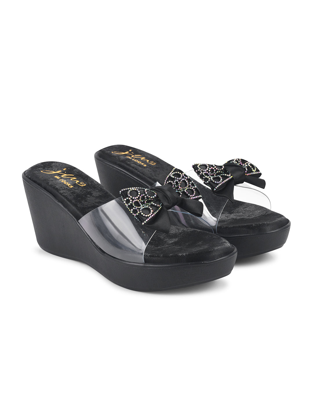 Jm Looks embellished bow wedge platform sandals, with one being worn
 Black