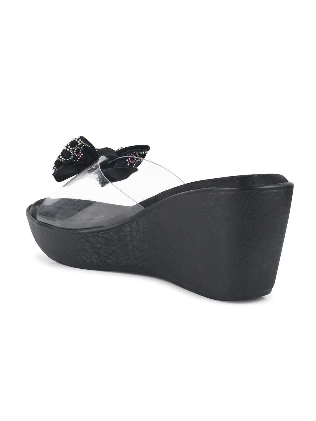 Jm Looks embellished bow wedge platform sandals, with one being worn
 Black
