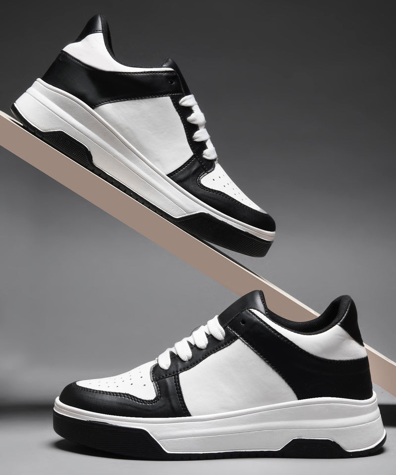 platform lace-up sneakers with a two-tone design and a chunky sole
 Black