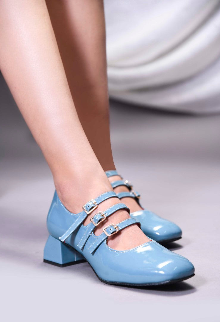Mary Jane shoe with three straps and buckle closures
 Sky Blue