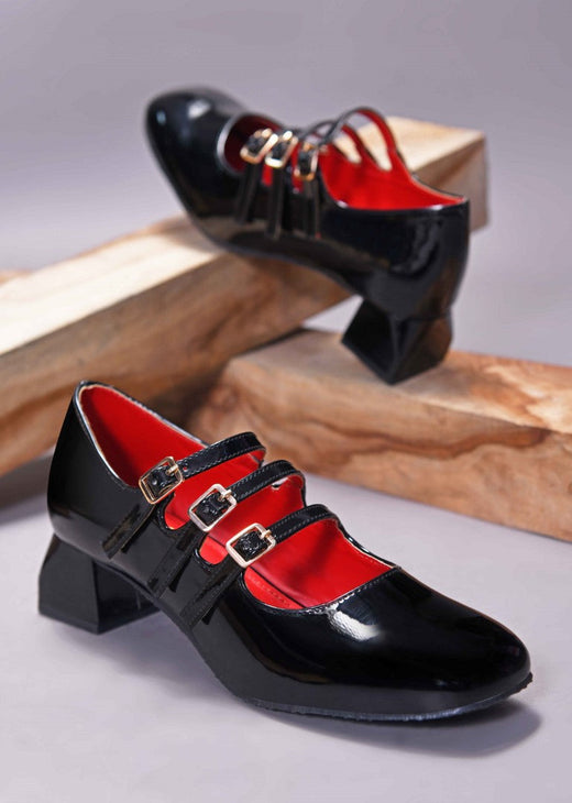 Black block heels for women featuring triple buckle straps, glossy patent finish, square toe, red lining