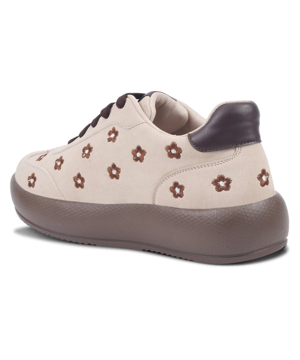 Cream suede sneakers for women with embroidered flowers, lace-up front and platform sole