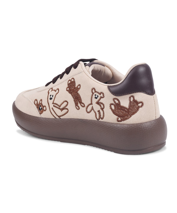Cream suede platform sneakers with brown teddy bear embroidery and dark brown laces and sole