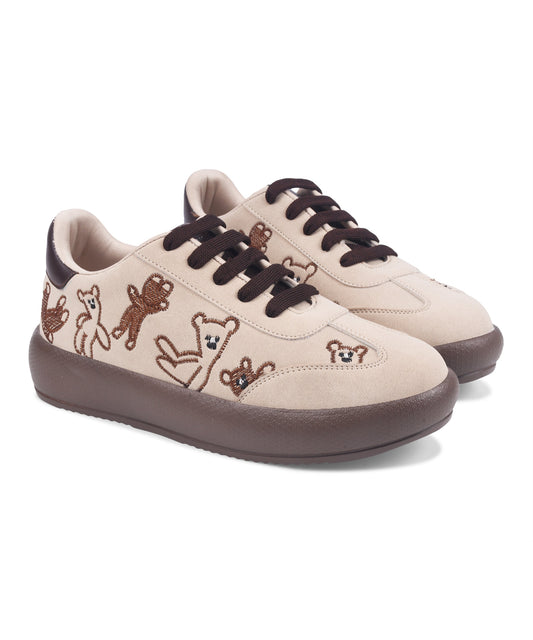 Cream suede platform sneakers with brown teddy bear embroidery and dark brown laces and sole