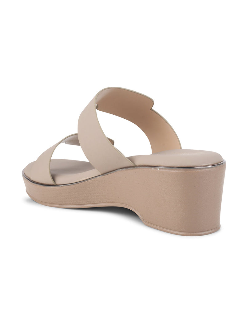 Beige block wedge heels for women featuring dual wide straps, comfortable platform sole, slip-on style.