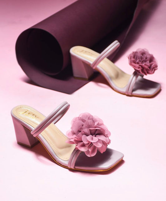 Jm Looks block heels featuring a large floral embellishment on the strap
 Wood Rose