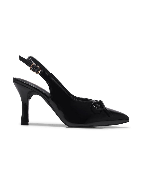 Black patent slingback pointed toe stiletto heels featuring bow detail, gold buckle ankle strap, glossy finish
