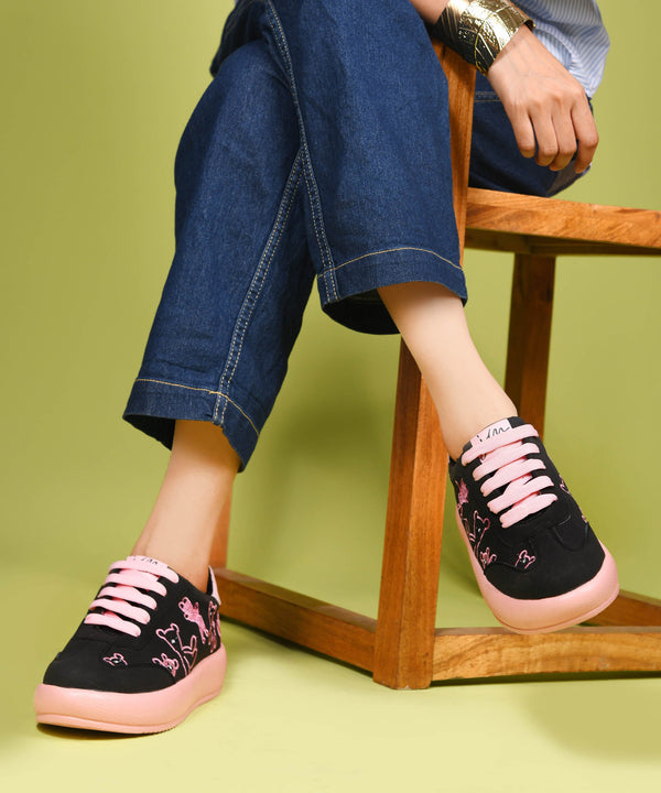 Black suede platform sneakers with brown teddy bear embroidery and dark brown laces and sole