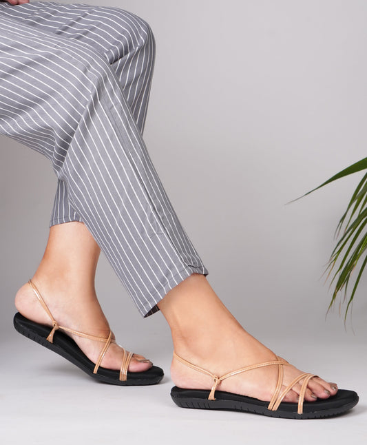 flat sandals with multiple slender straps and an adjustable ankle strap
 Sultan