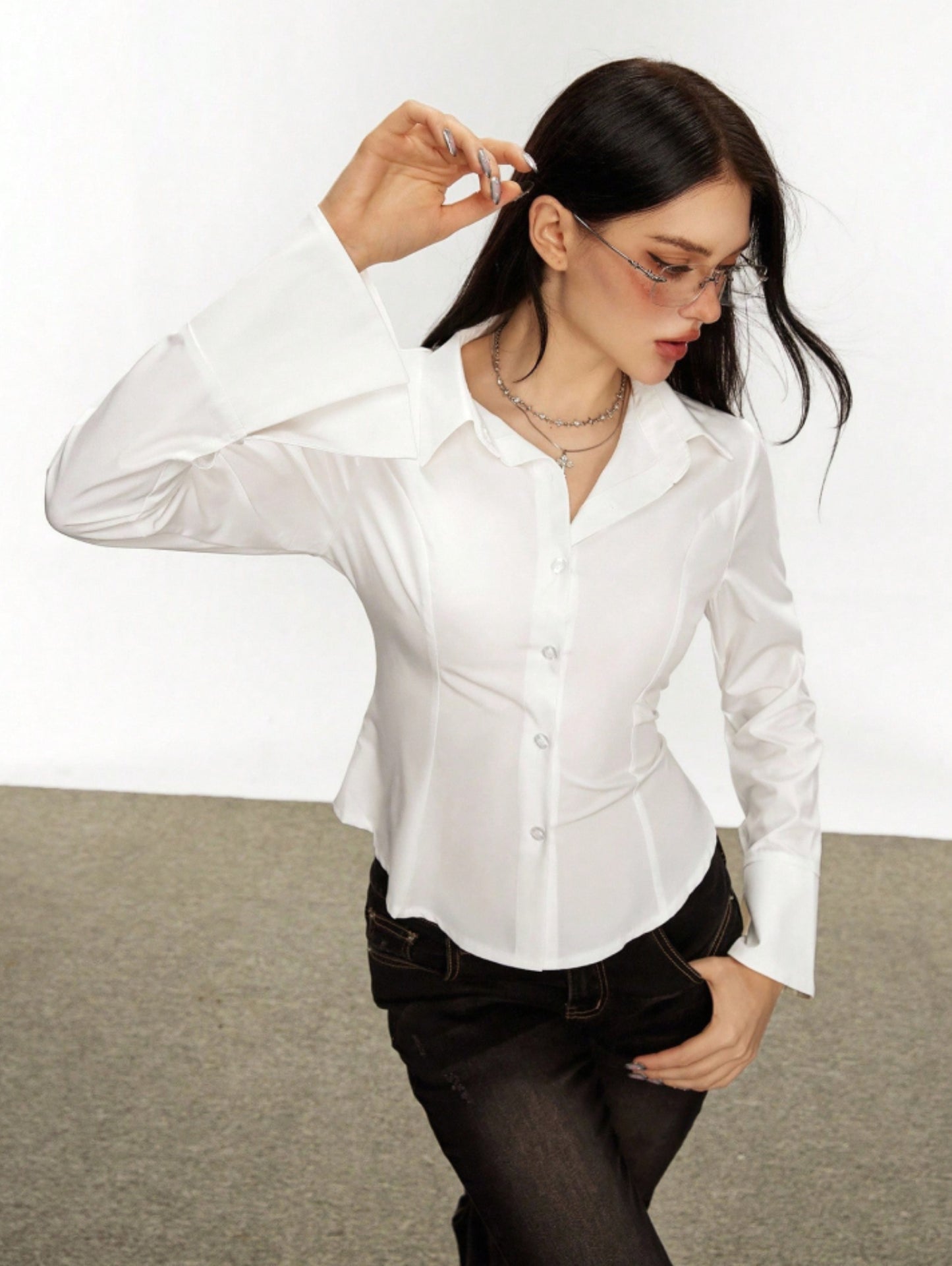 White corset lace-up back shirt with flared cuffs, pointed collar, button front, structured fitted waist seams