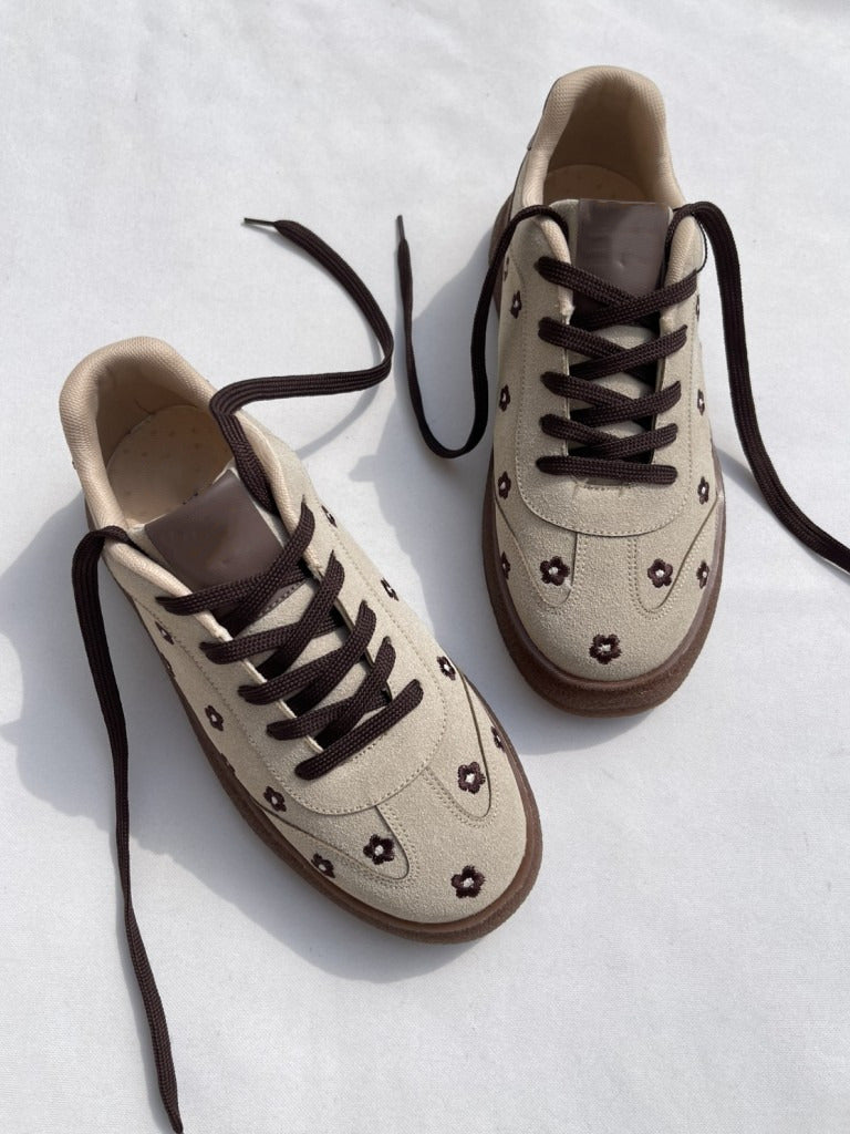 Cream suede sneakers for women with embroidered flowers, lace-up front and platform sole
