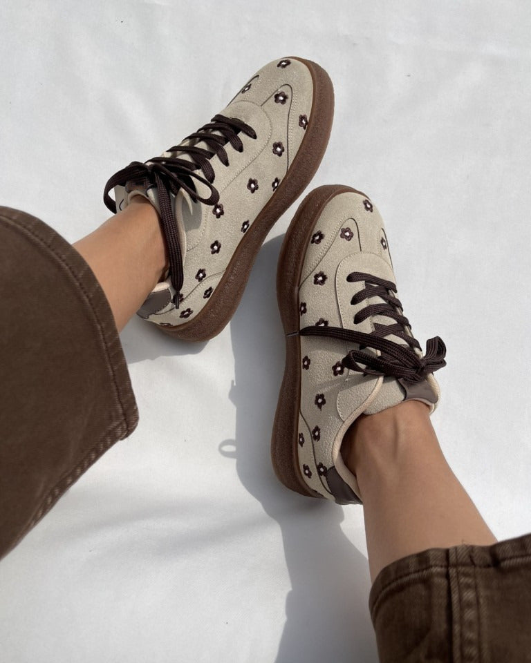 Cream suede sneakers for women with embroidered flowers, lace-up front and platform sole