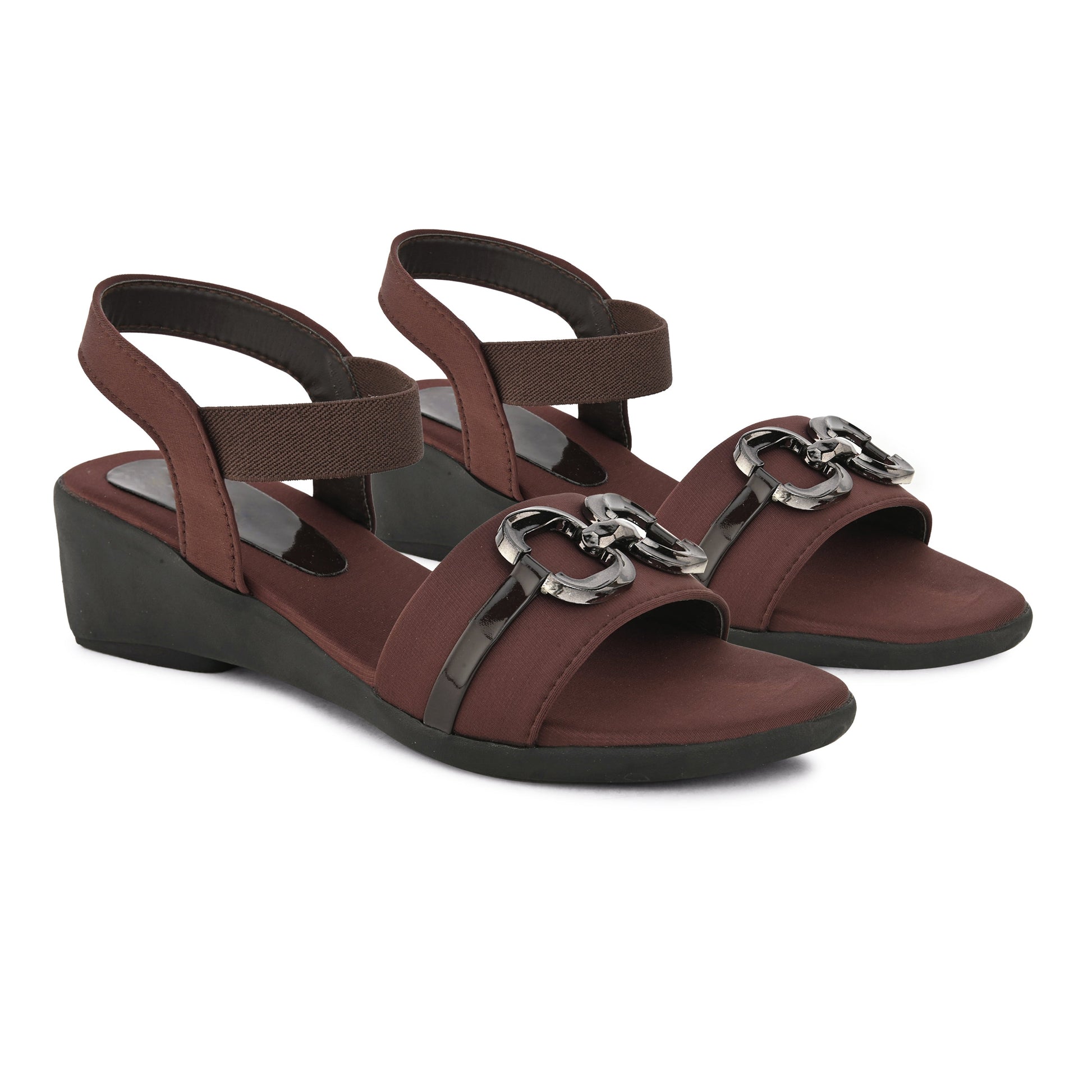 Jm Looks wedge sandals featuring a decorative buckle and an elastic ankle strap
 Brown