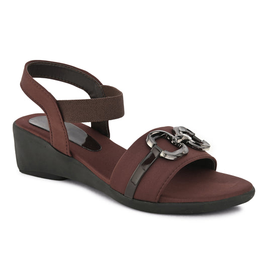 Jm Looks wedge sandals featuring a decorative buckle and an elastic ankle strap
 Brown