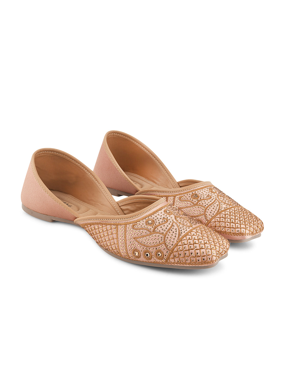 JM Looks women's juttis with intricate embellishments and a traditional design
 Beige