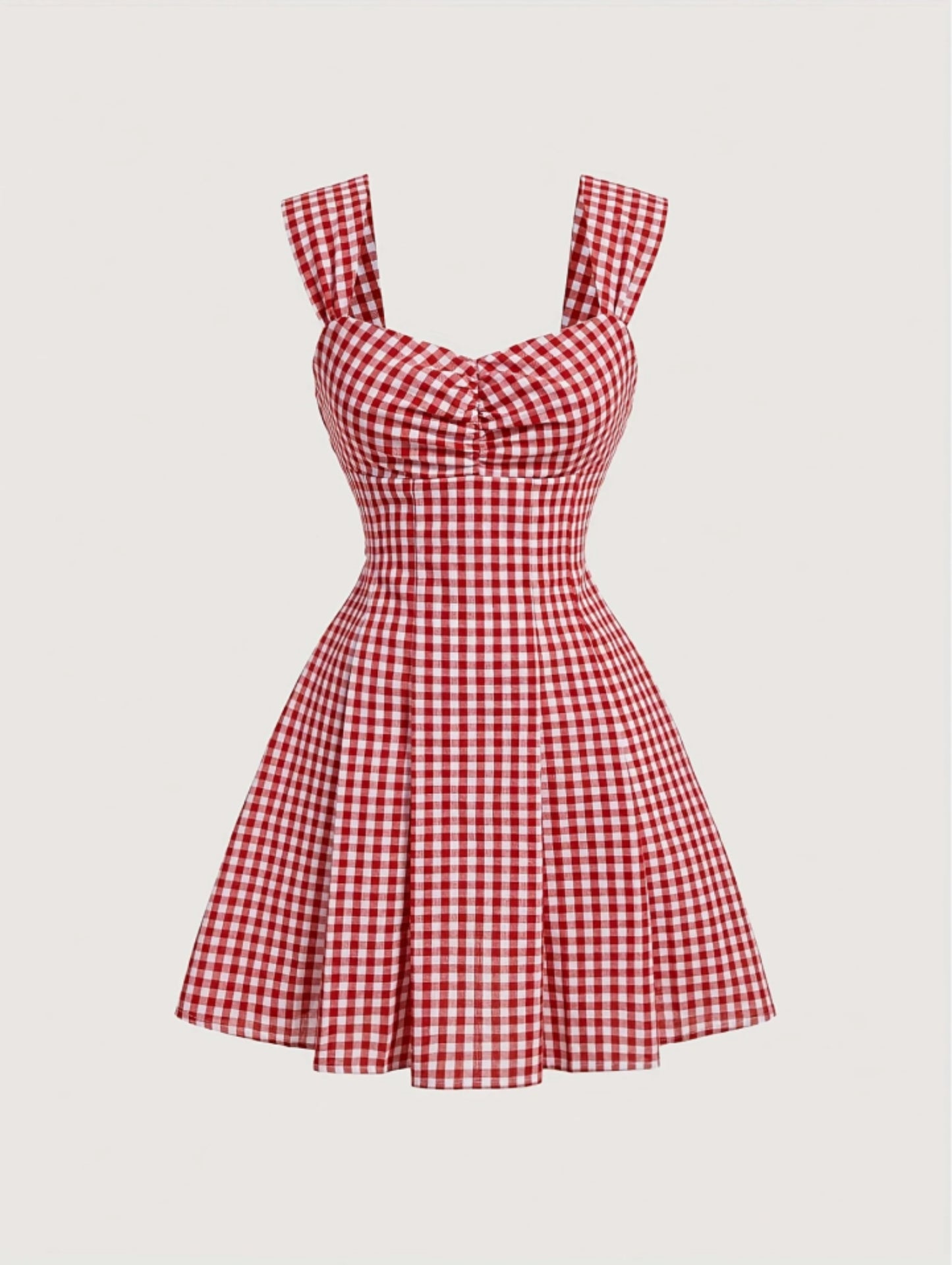 Red gingham sleeveless mini dress with bow detail, sweetheart neckline, wide straps, and flared A-line skirt
