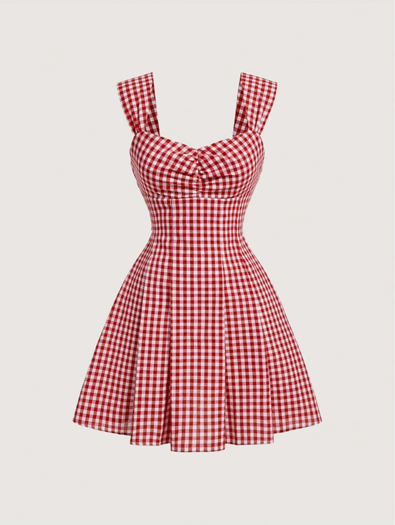 Red gingham sleeveless mini dress with bow detail, sweetheart neckline, wide straps, and flared A-line skirt