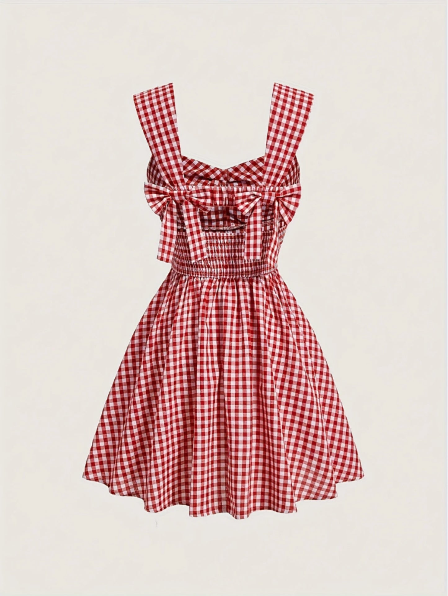Red gingham sleeveless mini dress with bow detail, sweetheart neckline, wide straps, and flared A-line skirt