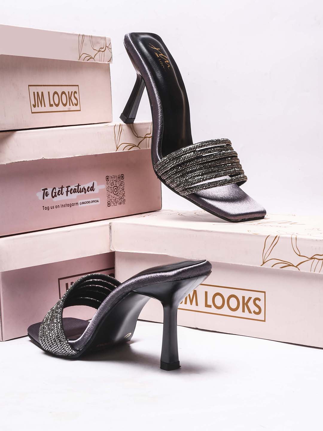 pen-toe high-heeled mules with an embellished wide strap and a contemporary square toe
 Grey