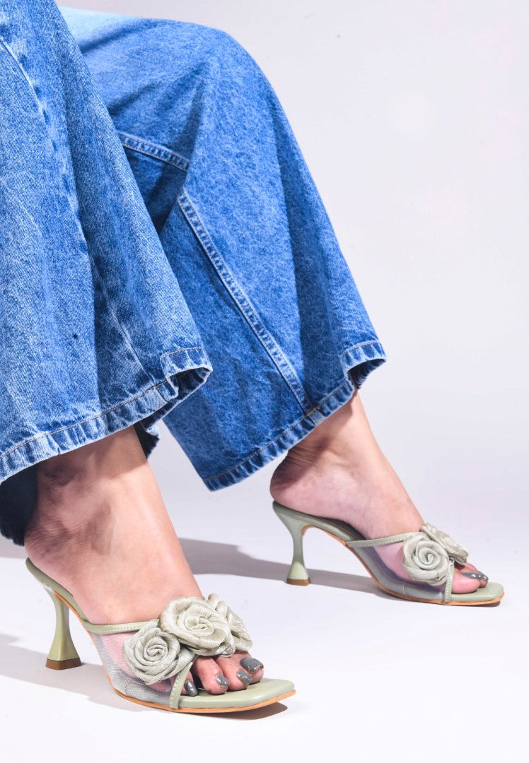 JM Looks heeled mules featuring two prominent floral appliques on the vamp strap and a flared heel
 Wine