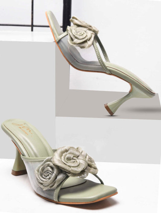 JM Looks heeled mules featuring two prominent floral appliques on the vamp strap and a flared heel
 Green